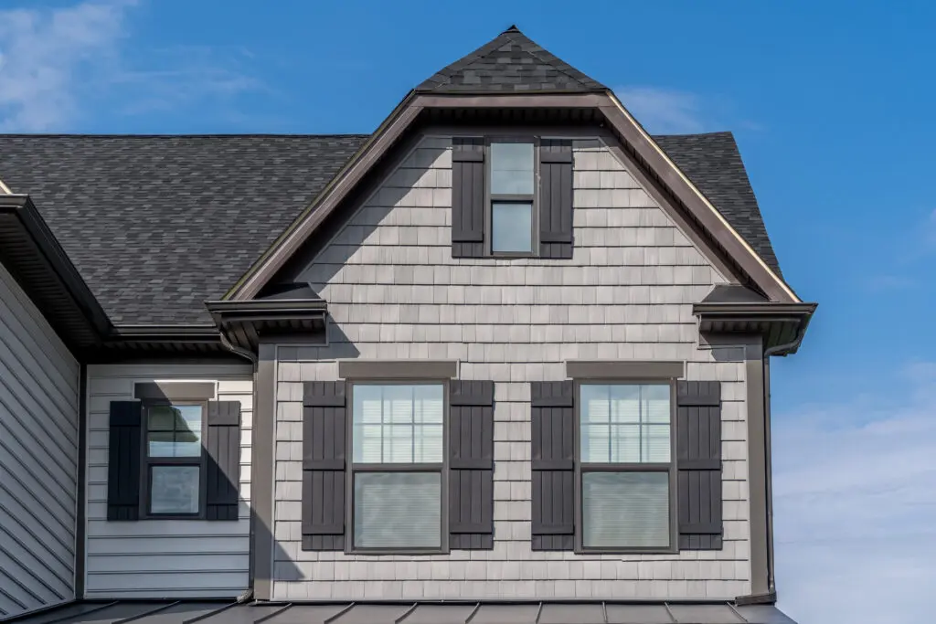 residential home with new siding and roof installation