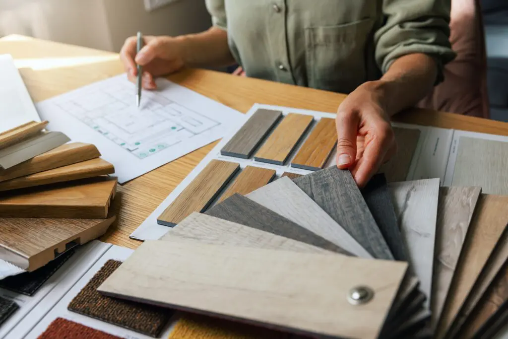 siding contractor reviewing siding material samples for home exterior