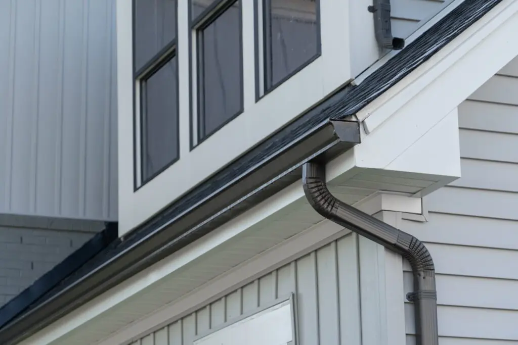 residential gutter and downspout system on home exterior