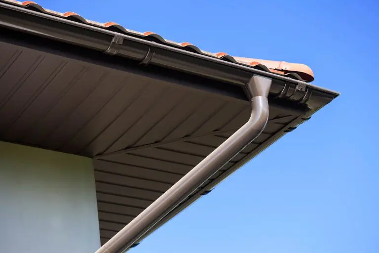 residential gutter system installed along roof edge