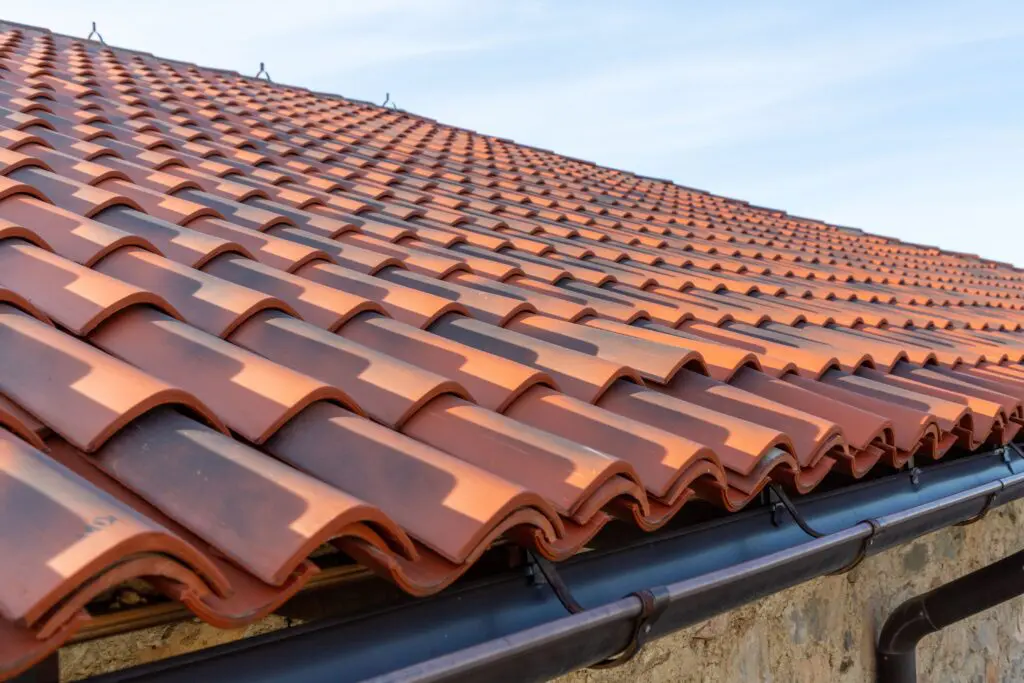 red clay tile roof on residential home
