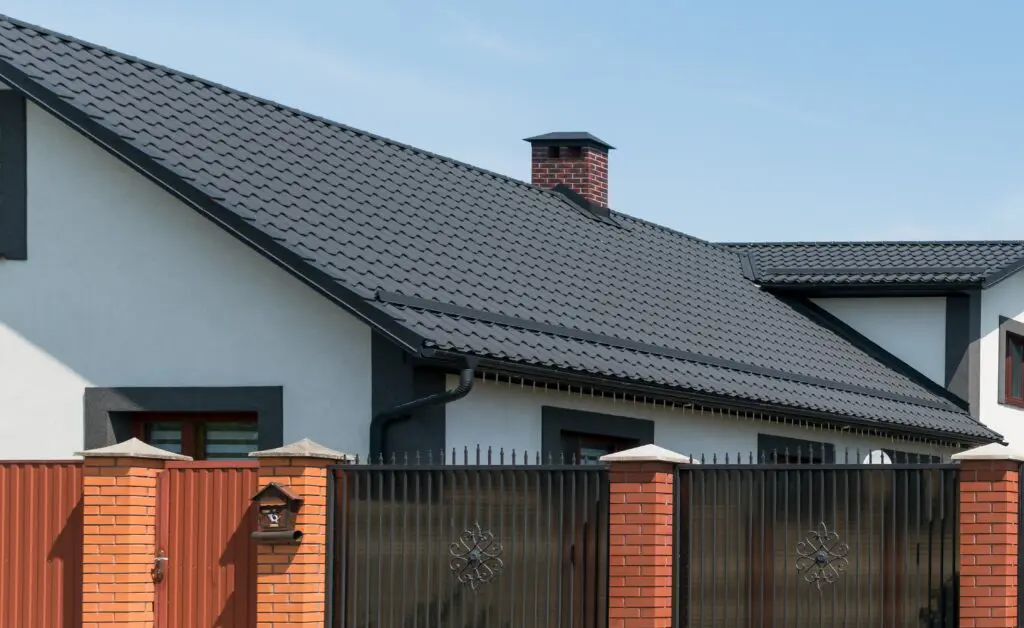 dark gray metal roofing system on residential home