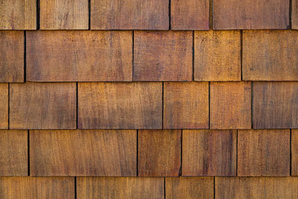 weathered cedar shake roofing shingles close up